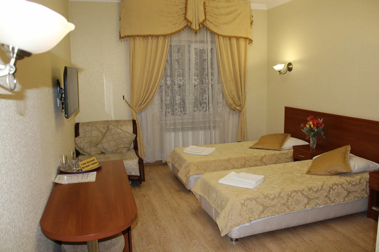 Номер «Двухместный номер с 2 двуспальными кроватями» в George Hotel