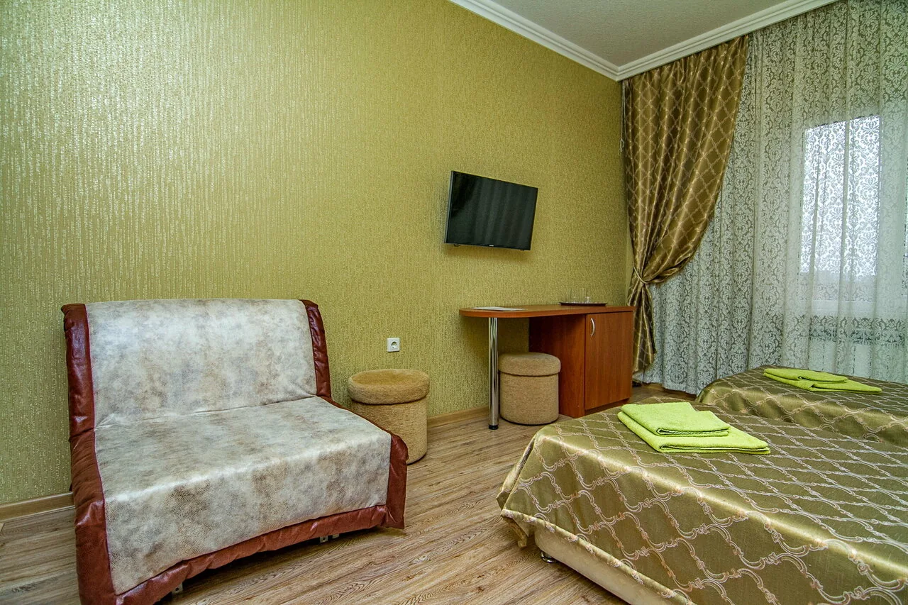 Номер «Двухместный номер с 2 двуспальными кроватями» в George Hotel